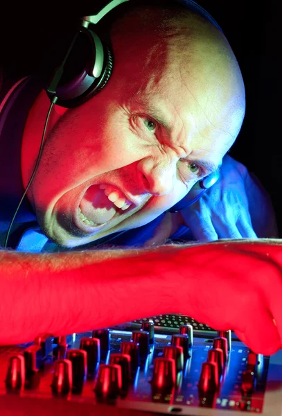 DJ going wild getting the crowd going — Stock Photo, Image