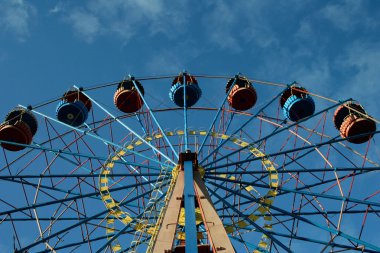 Observation wheel in amusement park clipart