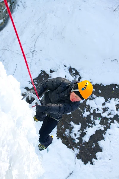 Ice climbing the waterfall. — Stock Photo, Image