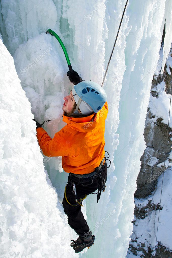 Ice climbing the waterfall.