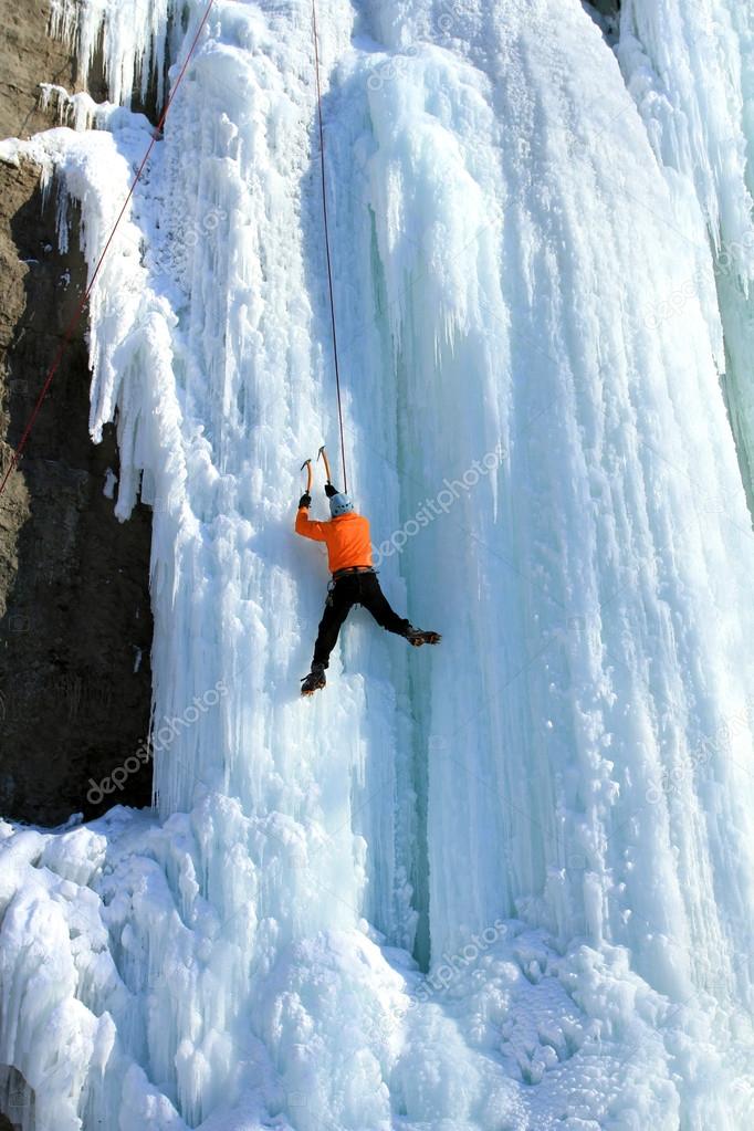 Ice climbing the waterfall.