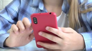 Child Playing Games Smartphone, Kid Browsing Internet on Phone, Teenager Blonde Girl Reading Messages, Searching Online on Devices