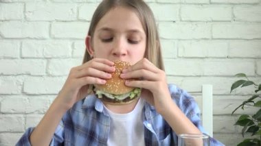 Child Eating Fast Food, Adolescent Kid Eats Hamburger in Restaurant, Teenager Girl with Unhealthy Cheeseburger Sandwiches, Snacks