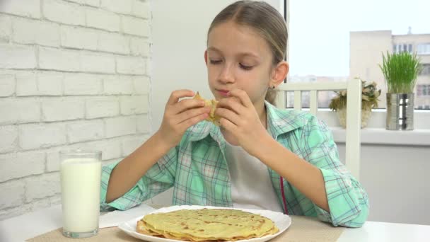 Child Eating Pancakes at Breakfast, Kid Eats Chocolate in Kitchen, Girl Preparing Sweet Griddle-Cake Snacks at Home — стокове відео