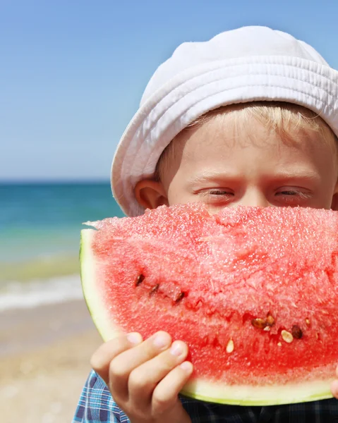 Closeup portreit boy with watermelon piece — Stock Photo, Image