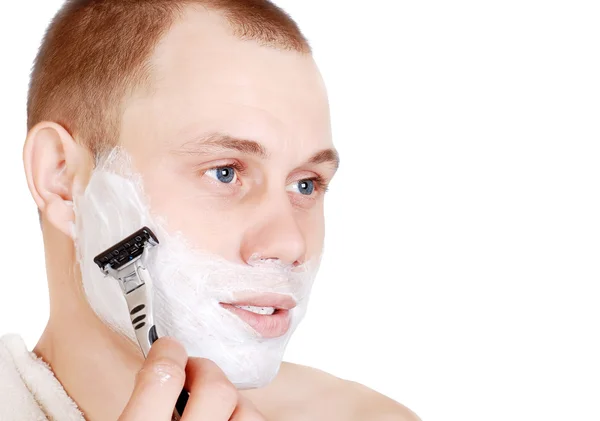 Shaving young man — Stock Photo, Image