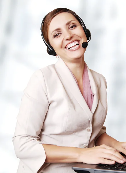 Happy smiling call center operator — Stock Photo, Image