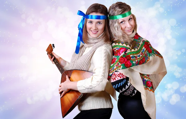 Two russian beauty girls with folk attributes — Stock Photo, Image