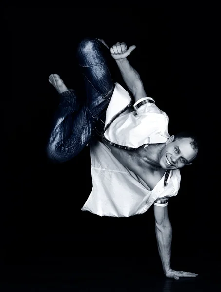 Homem equilibrado sobre a mão — Fotografia de Stock