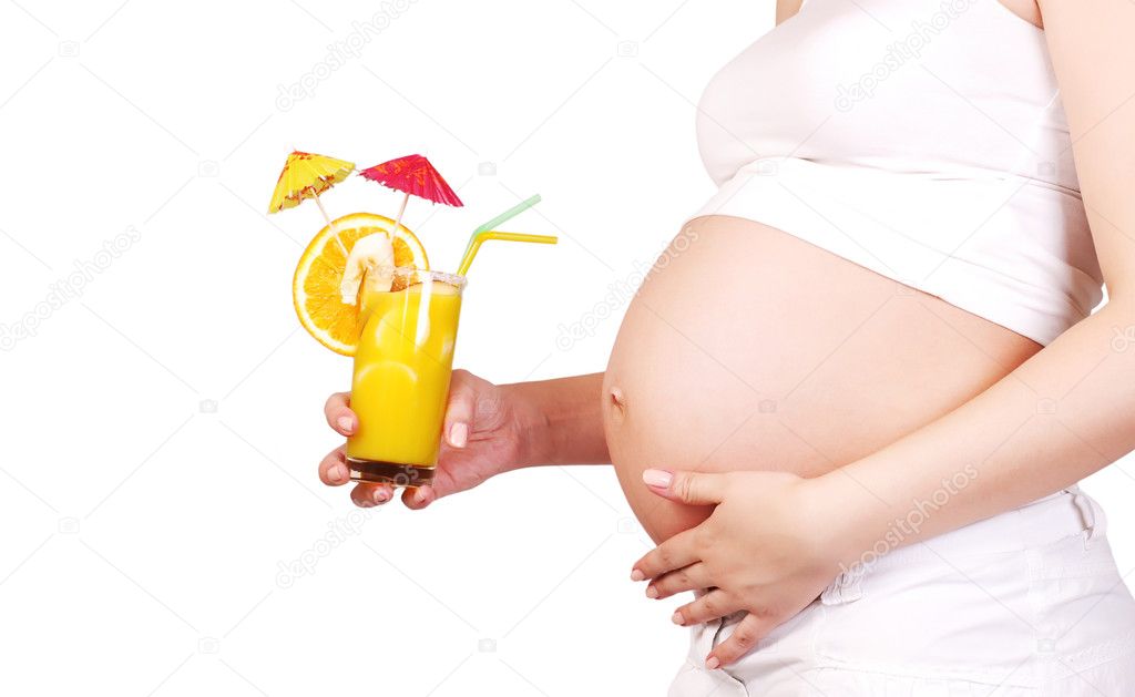 Pregnant woman with fruit cocktail