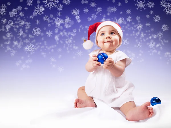 Funny baby girl in santa hat — Stock Photo, Image