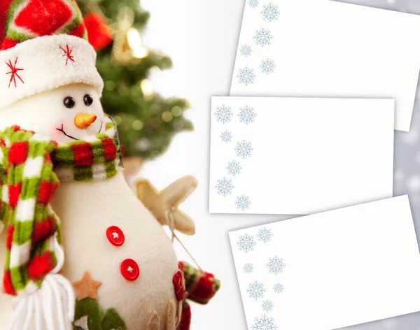 Background with snowman and paper blanks — Stock Photo, Image