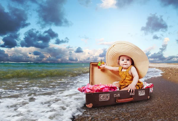 Travel concept image with baby in suitcase — Stock Photo, Image