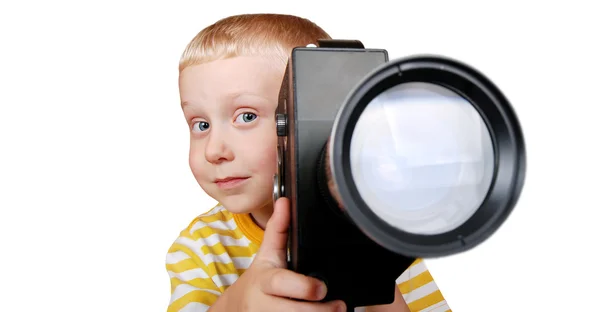 Хлопчик зі старою кінокамерою — стокове фото