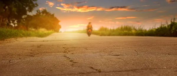 Old road closeup image at sunset time — kuvapankkivalokuva