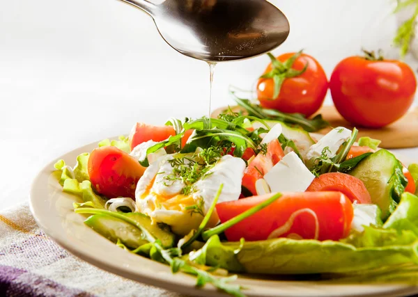 Fresh spring salad with seed oil — Stock Photo, Image
