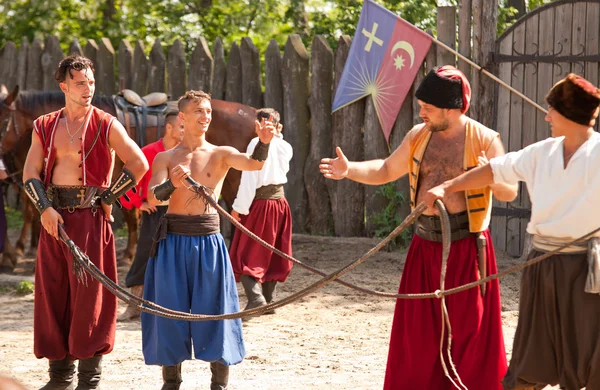 Performing with whips — Stock Photo, Image