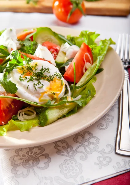 Light salad with pouched egg