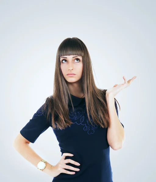 Beautiful young lady in thoughtful pose — Stock Photo, Image