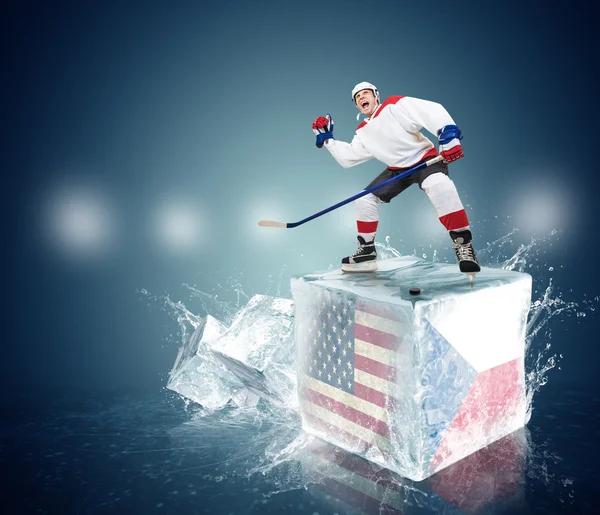 Screaming hockey player on ice cubes . — 스톡 사진
