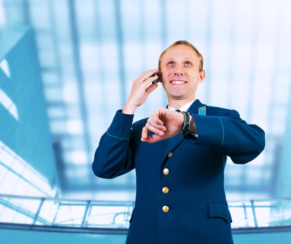Aircraft captain portrait in airport — Stock Photo, Image