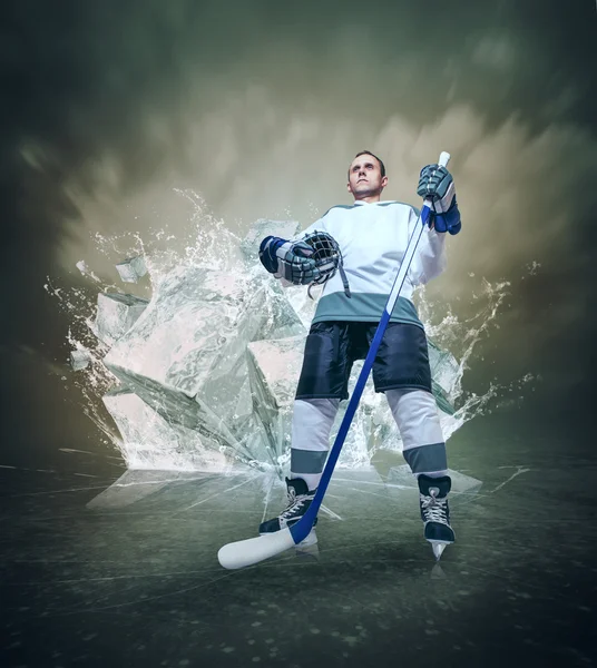 Hockey player portrait on abstract ice background — Stock Photo, Image