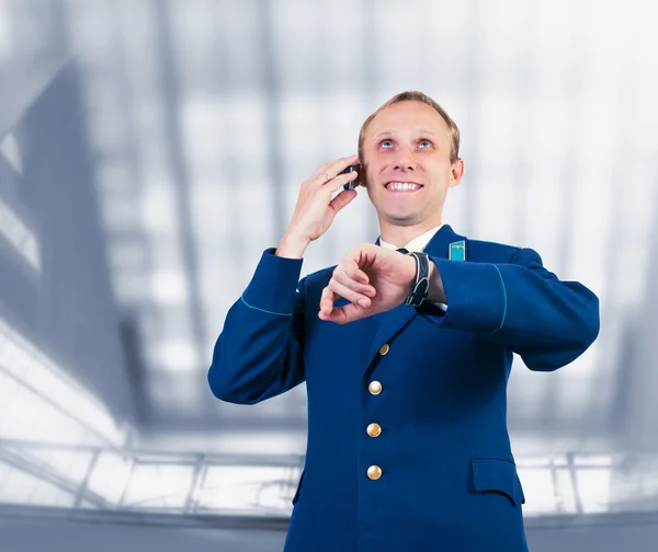 Aircraft captain portrait in airport — Stock Photo, Image