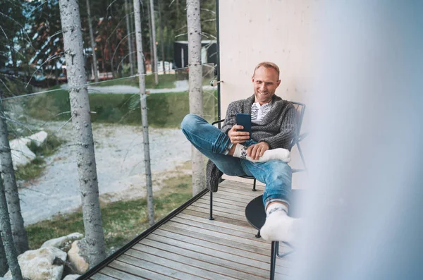 Smiling Middle Aged Man Dressed Open Cardigan Jeans Warm Socks — Stock Photo, Image