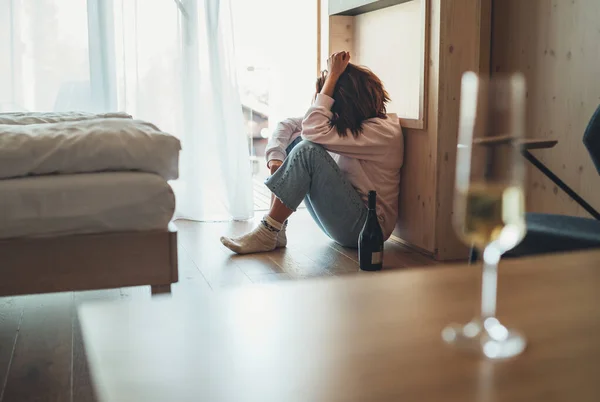 Sad Woman Sitting Floor Bedroom Bottle Alcohol Unfocused Wine Glass — 图库照片