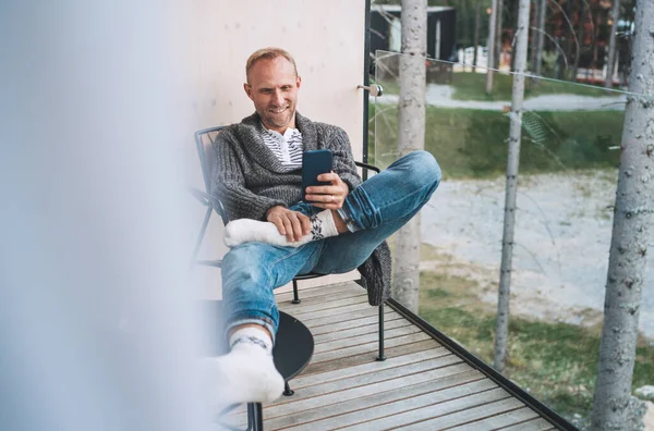 Smiling Middle Aged Man Dressed Open Cardigan Jeans Warm Socks — стоковое фото