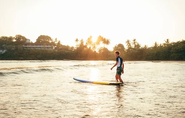Young Teenager Boy Colorful Surfboard Sea Surfing Enjoying Beautiful Sunset — Stockfoto