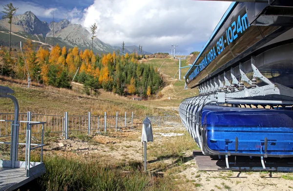 Blue cableway in Tatranska Lomnica - High Tatras, Slovakia — Stock Photo, Image