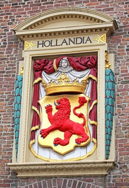 Símbolo HOLLANDIA sobre o edifício na cidade Haia, Netherla — Fotografia de Stock