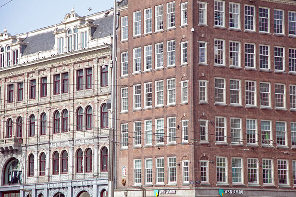 AMSTERDAM, NETHERLANDS - APRIL 3: Typical architecture in city Amsterdam on April 3, 2014 in Amsterdam