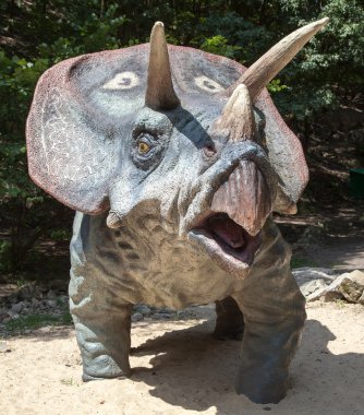 Realistic model of dinosaur Triceratops clipart