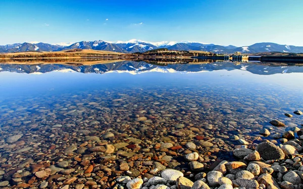 Reflection Snowy Hills Water Surface Lake Low Tatras Mountains Background — Fotografia de Stock