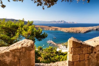 LINDOS, GREECE - JULY 1, 2022: View on Rhodes island from Lindos acropolis