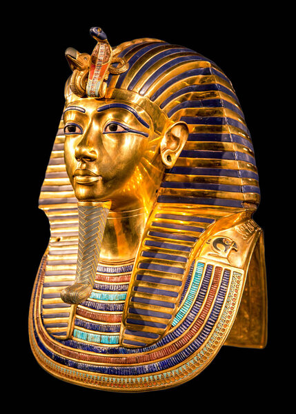 Tutankhamun's golden burial mask on black bacground. King Tut.