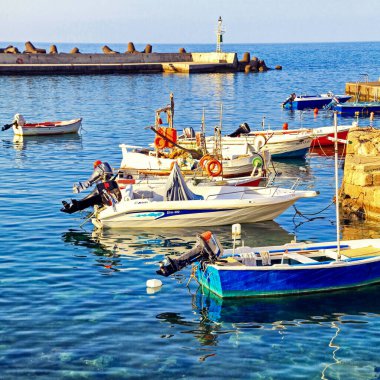 PANORMOS, CRETE - SEPTEMBER 3, 2013: Boats in small port in village Panormo at Crete island at Greece