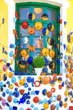 MARGARITES, GREECE - SEPTEMBER 8, 2013: Market decorated  by handmade ceramics in village Margarites at Crete island, Greece