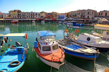 RETHYMNO, GREECE - SEPTEMBER 11, 2013: Fishing boats in port at town Rethymno in crete island at Greece