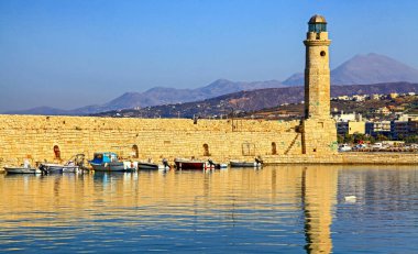 RETHYMNO, GREECE - SEPTEMBER 11, 2013: Lighthouse in old town at city Rethymno in Crete island at Greece