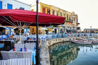 RETHYMNO, GREECE - SEPTEMBER 11, 2013: Tavernas and restaurants in old town in city Rethymno in Crete island at Greece
