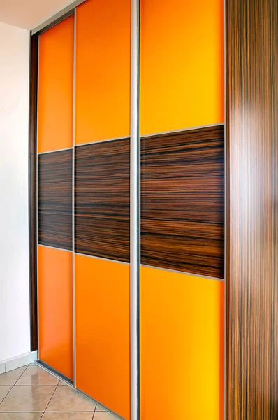 Closed Orange Wooden Large Wardrobe — Zdjęcie stockowe