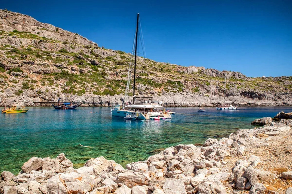FALIRAKI, GREECE - JULY 4, 2022:Luxurios yachts in Anthony Quinn bay with crystal clear water in Rhodes island, Greece