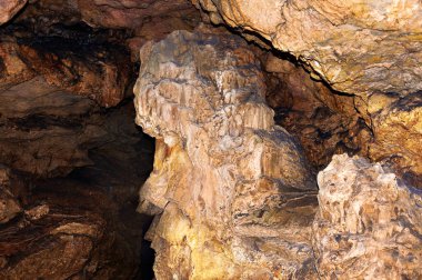 Stalactite, stalagmite walls of the cave. Template for design. Pattern clipart
