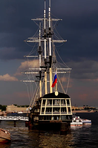 Ship on stormy sky background Royalty Free Stock Images