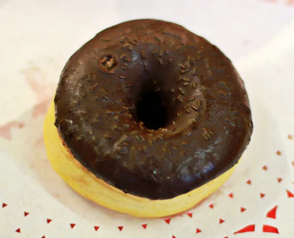 Donut with chocolate glaze — Stock Photo, Image