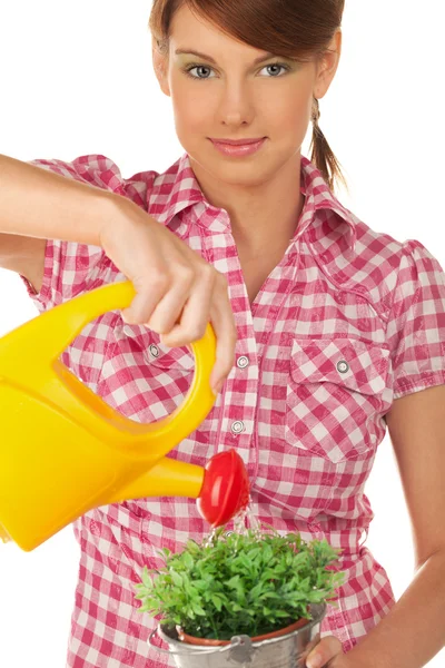 Girl with watering can — Stock Photo, Image