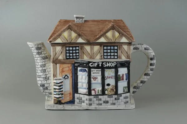 Porcelain teapot in the form of a house. — Stock Photo, Image